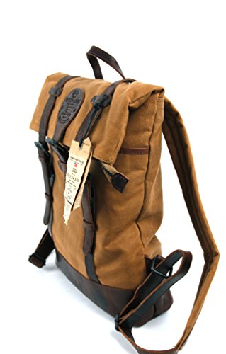 Diseño urbano y atemporal para esta mochila de cuero y lona, con compartimento acolchado para el portátil, color coñac y marrón, Presly Sun, ideal para uso profesional